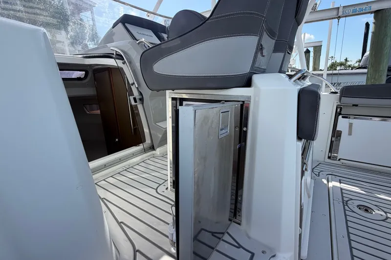 Slide: The Image of 2021 Jeanneau Cap Camarat 9.0 WA boat interior with seating and storage. - 20