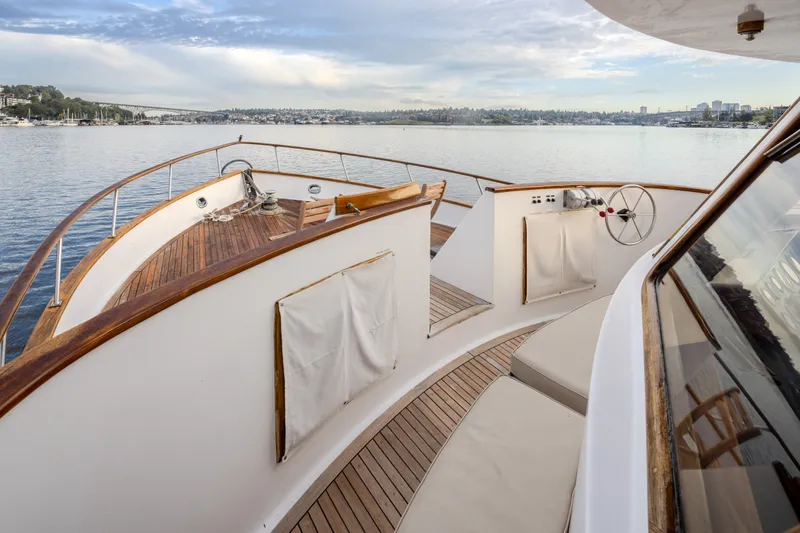 Slide: The Image of 1982 Ocean Alexander 50 Mark I yacht deck with scenic waterfront view. - 35