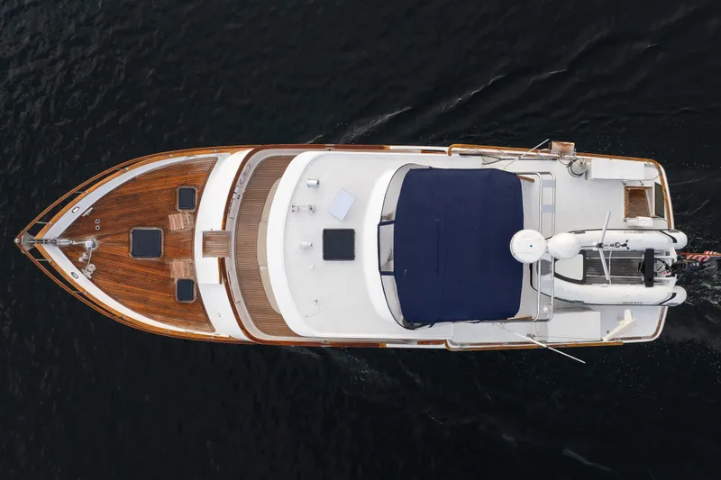 Slide: The Image of Aerial view of 1982 Ocean Alexander 50 Mark I yacht on dark water. - 46
