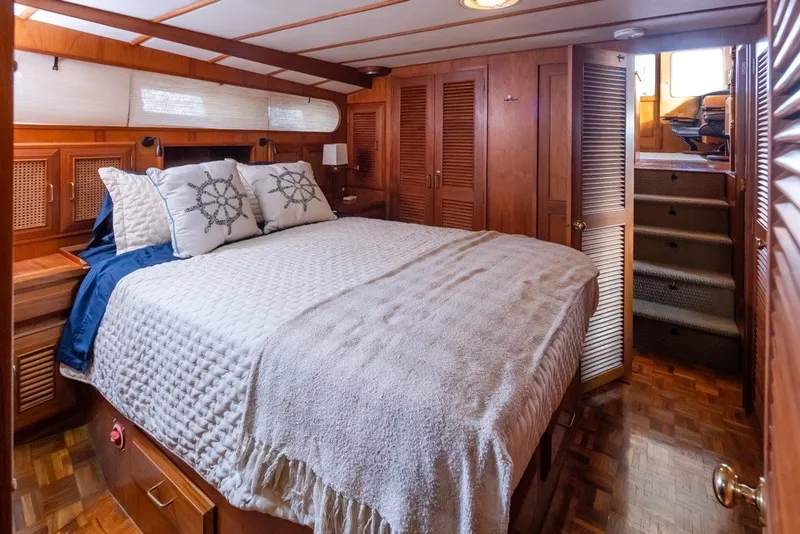 Slide: The Image of Cozy bedroom in 1982 Ocean Alexander 50 Mark I yacht with nautical decor. - 19
