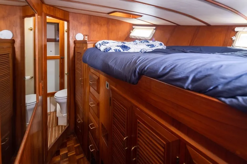 Slide: The Image of Interior cabin of 1982 Ocean Alexander 50 Mark I yacht with wooden finishes. - 24