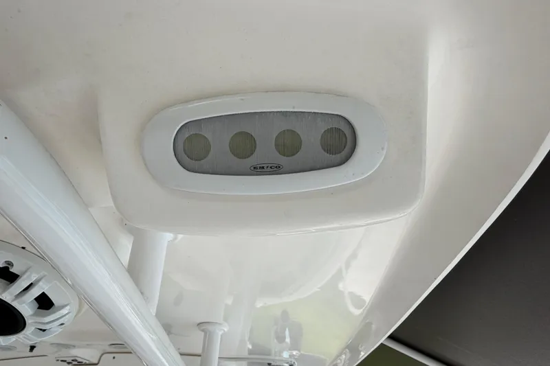 Slide: The Image of 2016 Sea Hunt Gamefish 25 boat detail, featuring a ceiling-mounted light fixture. - 36