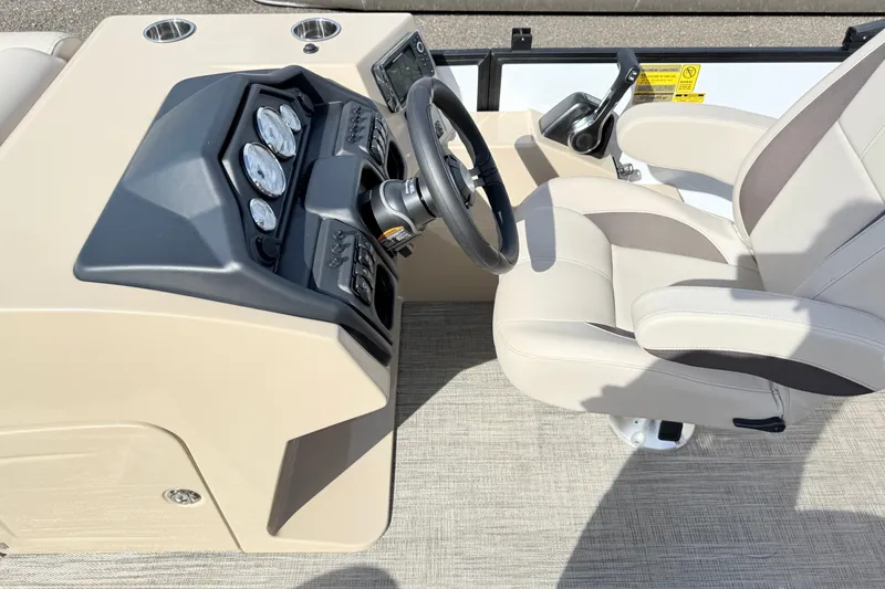 Slide: The Image of Captain's seat and dashboard of 2027 Bentley Pontoons Legacy 223 Navigator. - 11