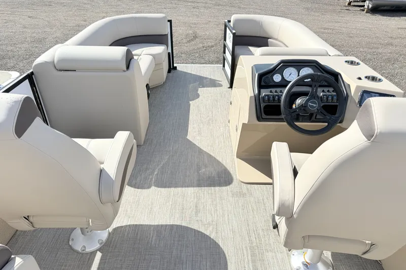 Slide: The Image of 2027 Bentley Pontoons Legacy 223 Navigator interior with plush seating and modern dashboard. - 6
