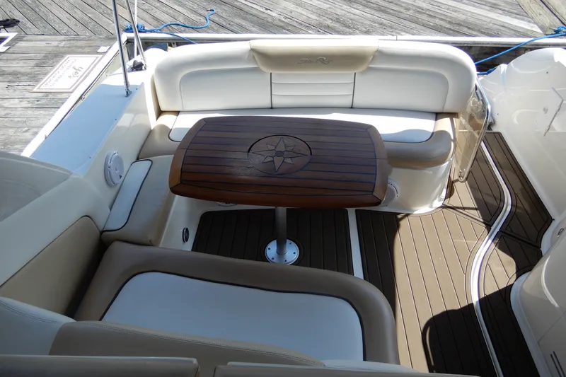 Slide: The Image of Luxurious seating area on a 2008 Sea Ray Sundancer 330 yacht with wooden table. - 10