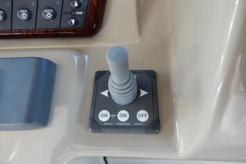 Slide: The Image of Control panel of a 2008 Sea Ray Sundancer 330 boat with thruster joystick. - 35