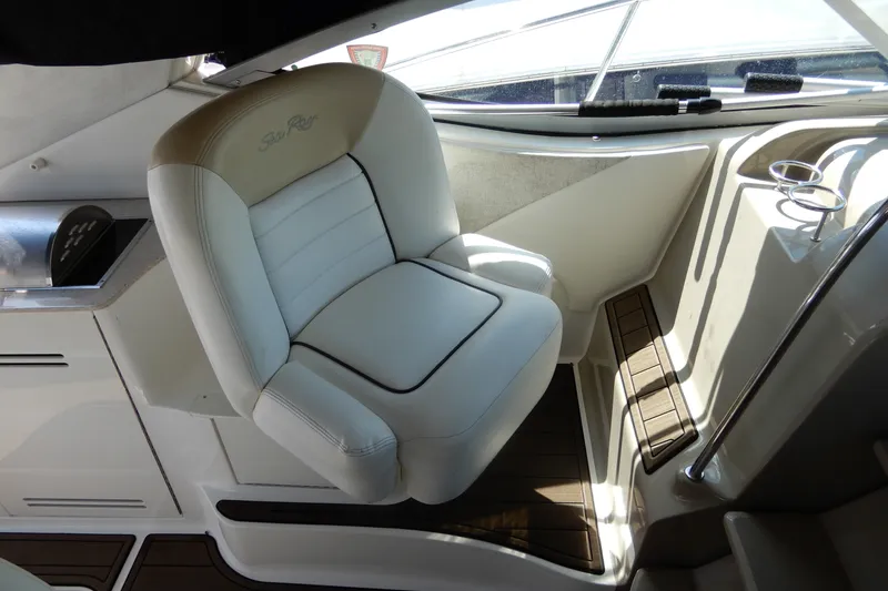Slide: The Image of Captain's chair on 2008 Sea Ray Sundancer 330 yacht, featuring sleek design and comfortable seating. - 22