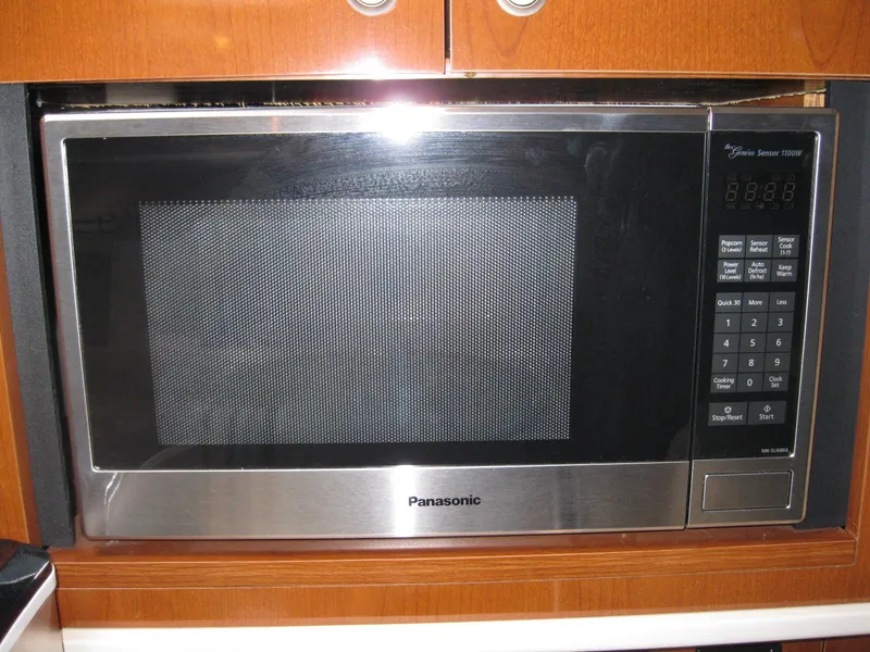 Slide: The Image of Panasonic microwave installed in a 2008 Sea Ray 330 Sundancer yacht kitchen. - 44