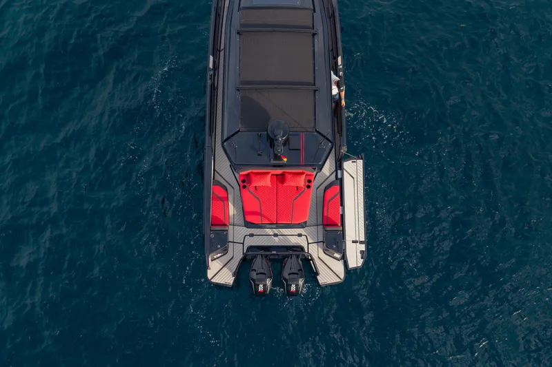 Slide: The Image of Aerial view of 2027 BRABUS 1000 luxury boat on blue ocean water. - 13