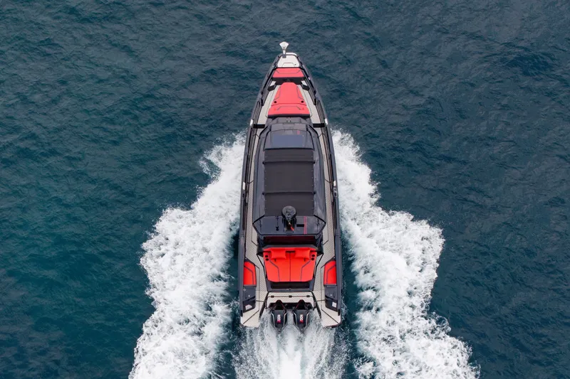 Slide: The Image of Aerial view of a 2027 BRABUS 1000 XC Cross Cabin on the water. - 9