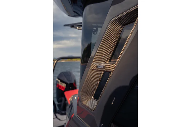 Slide: The Image of Close-up of 2027 BRABUS 1000 boat detail with carbon fiber accents. - 27