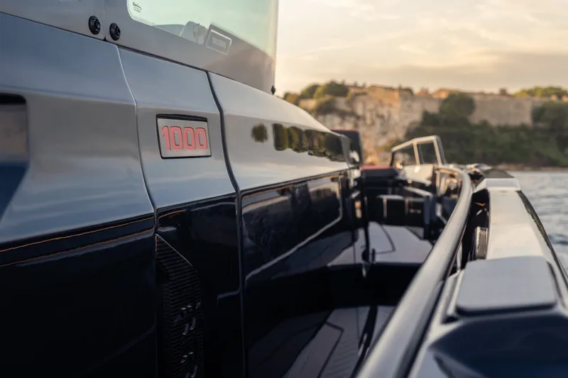 Slide: The Image of Luxury BRABUS 1000 yacht, 2027 model, sleek design with scenic coastal backdrop. - 17