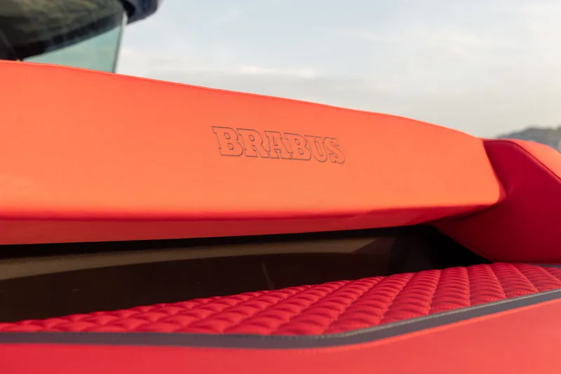 Slide: The Image of Red BRABUS 1000 interior detail, 2027 model, featuring quilted upholstery. - 25
