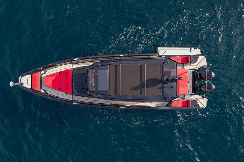 Slide: The Image of Aerial view of 2027 BRABUS 1000 luxury yacht on open water. - 11