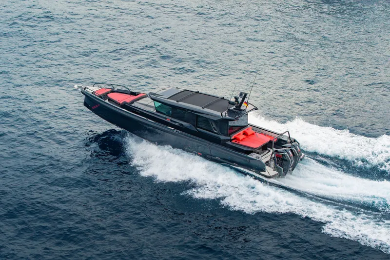 Slide: The Image of 2027 BRABUS 1000 boat cruising on open water, showcasing sleek design and performance. - 5