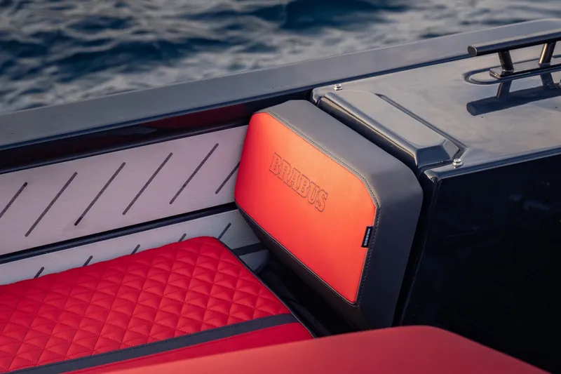 Slide: The Image of Red and gray upholstery on a BRABUS 1000 XC Cross Cabin boat, featuring quilted design. - 24