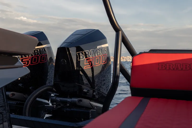 Slide: The Image of Twin BRABUS 500 engines on a 2027 BRABUS 1000 boat, with red seating. - 15