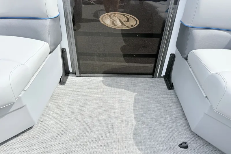 Slide: The Image of Interior of 2027 Bentley Pontoons Legacy 223 Navigator with gray seating and flooring. - 14