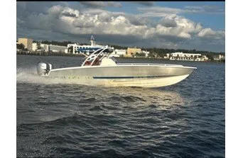 The Image of 2017 Concept 36' Open Deck boat cruising on water under cloudy sky. - 0