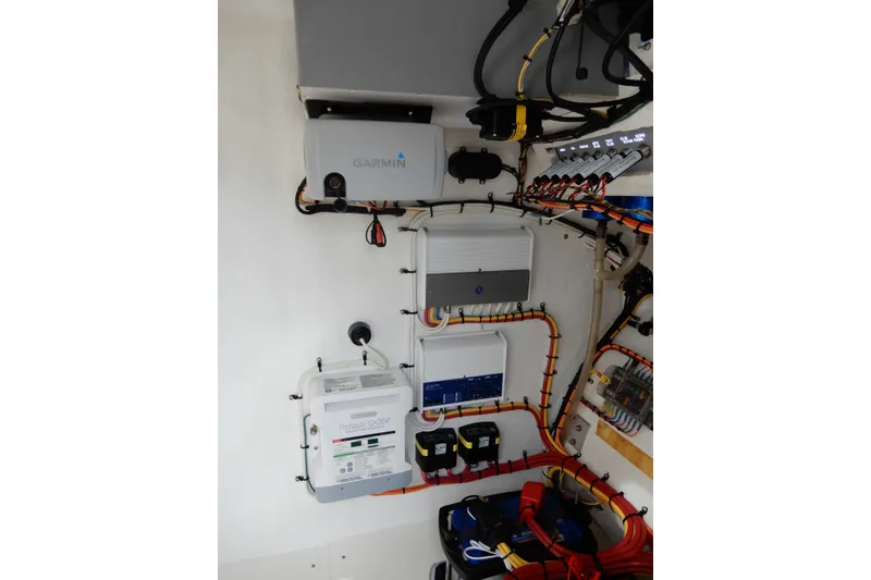 Slide: The Image of Electrical system setup in a 2017 Concept 36' Open Deck boat, featuring Garmin equipment. - 33