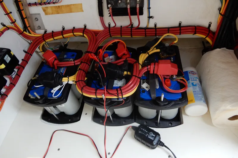 Slide: The Image of Battery setup in a 2017 Concept 36' Open Deck boat with organized wiring. - 34