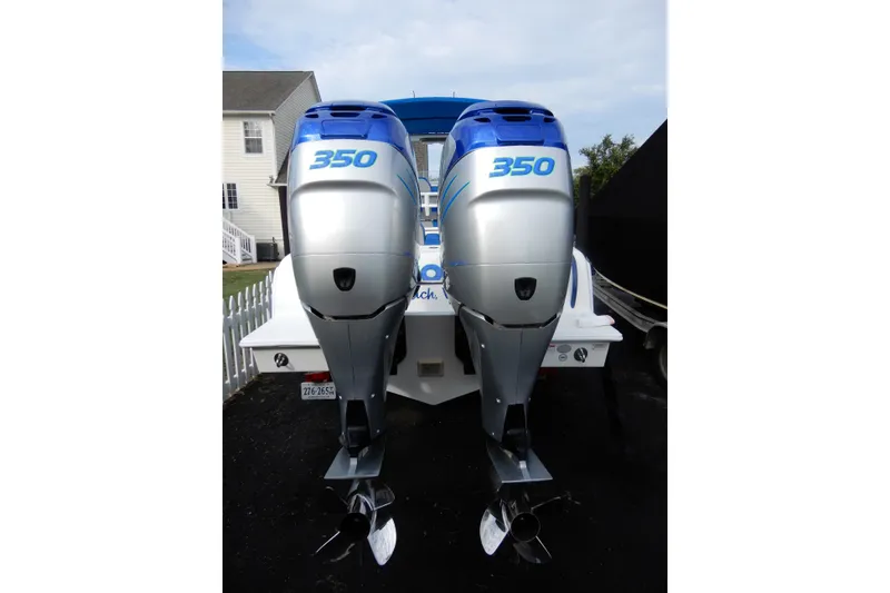 Slide: The Image of Twin 350 horsepower outboard motors on a 2017 Concept 36' Open Deck boat. - 53