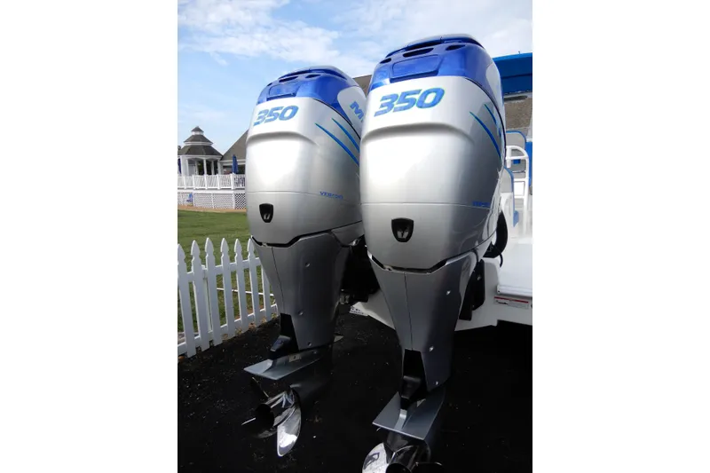 Slide: The Image of Twin 350 horsepower outboard motors on a 2017 Concept 36' Open Deck boat. - 54
