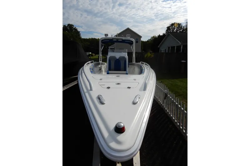 Slide: The Image of 2017 Concept 36' Open Deck boat with sleek design, parked outdoors. - 13
