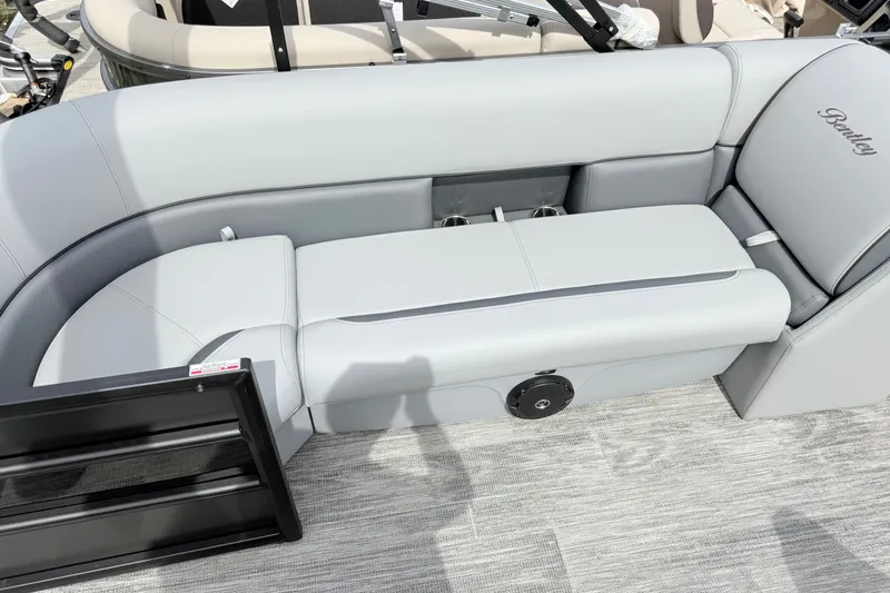 Slide: The Image of 2027 Bentley Pontoons Bolt 223 interior seating with elegant gray upholstery. - 7