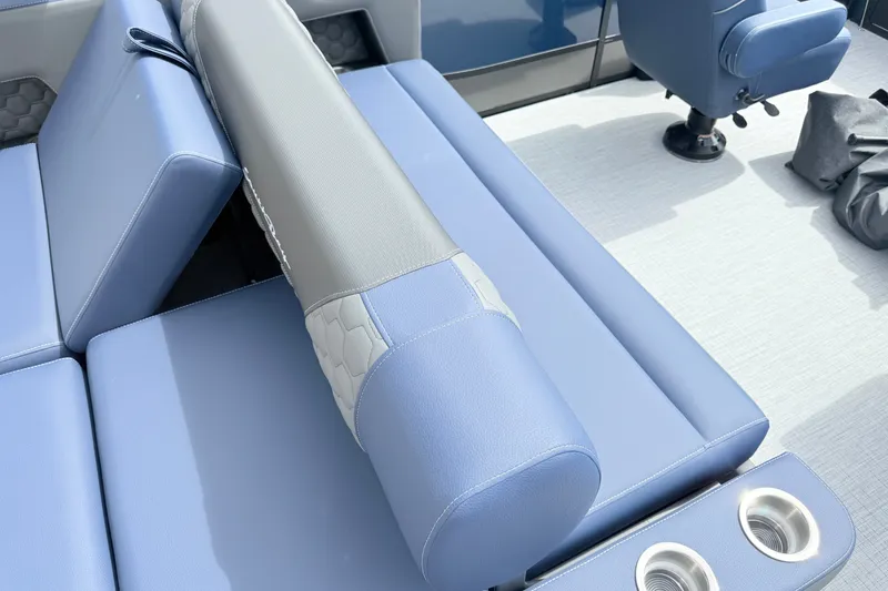Slide: The Image of Luxurious seating on 2026 South Bay 525UL DC boat with cup holders and modern design. - 22