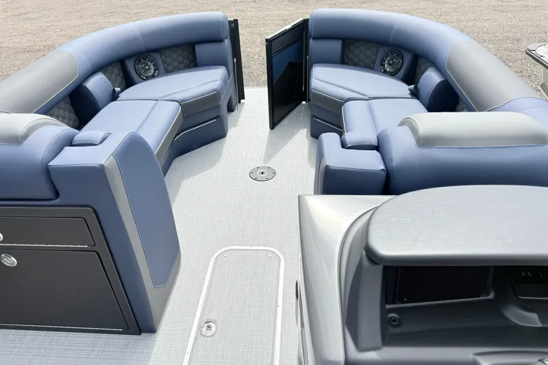 Slide: The Image of Luxurious seating on 2026 South Bay 525UL DC pontoon boat interior. - 16