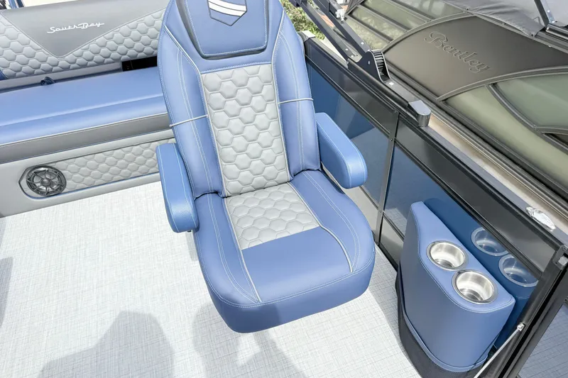 Slide: The Image of Luxurious seating on 2026 South Bay 525UL DC boat with cup holders and stylish design. - 10