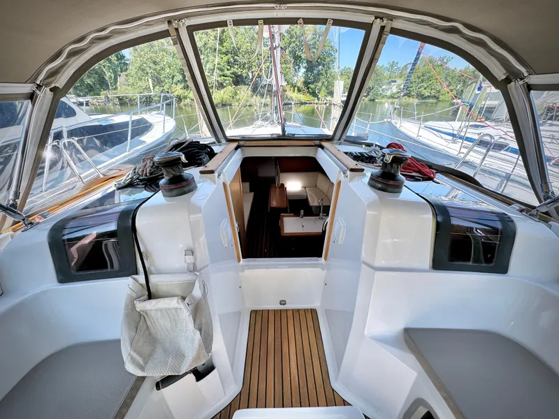 Slide: The Image of 2015 Jeanneau Sun Odyssey 379 cockpit with teak flooring and dual helm stations. - 30