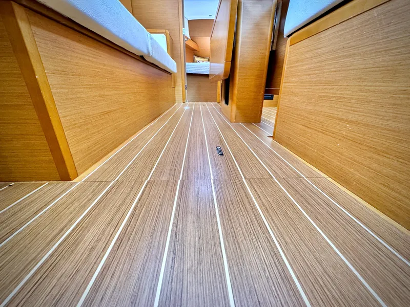 Slide: The Image of Interior view of 2015 Jeanneau Sun Odyssey 379 sailboat with wooden flooring. - 38