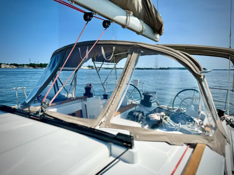 Slide: The Image of 2015 Jeanneau Sun Odyssey 379 sailboat cockpit with ocean view. - 21