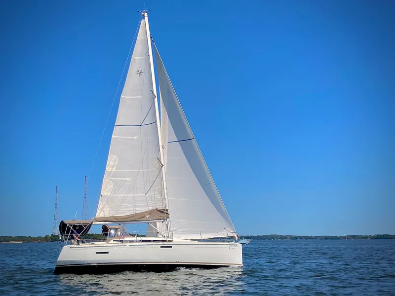Slide: The Image of 2015 Jeanneau Sun Odyssey 379 sailing on a clear blue day. - 1