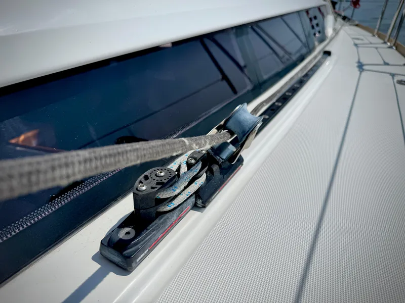 Slide: The Image of Jeanneau Sun Odyssey 379 sailboat deck detail, 2015 model, featuring rigging and window. - 22