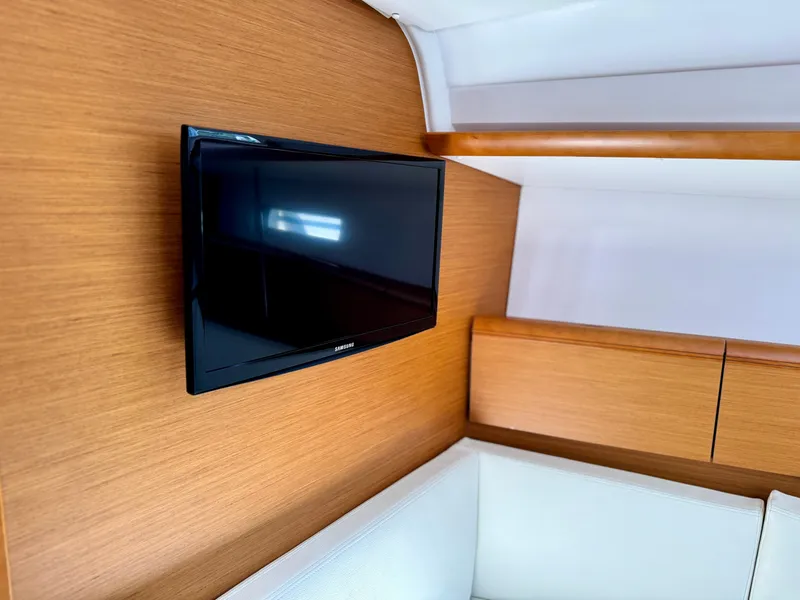 Slide: The Image of Flat-screen TV in 2015 Jeanneau Sun Odyssey 379 yacht interior. - 39