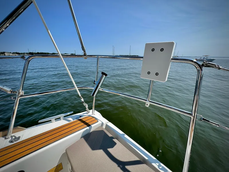 Slide: The Image of 2015 Jeanneau Sun Odyssey 379 sailboat deck overlooking calm waters. - 29
