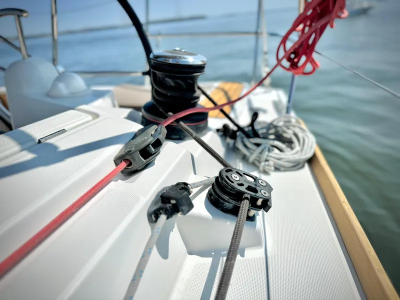 Slide: The Image of Close-up of Jeanneau Sun Odyssey 379 sailboat deck, showcasing winches and ropes, 2015 model. - 23