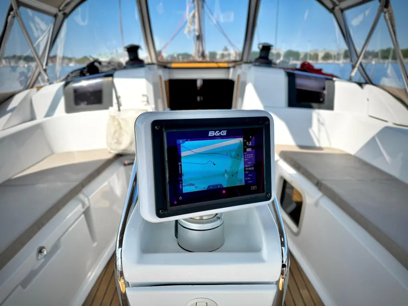 Slide: The Image of Jeanneau Sun Odyssey 379 cockpit with navigation system, 2015 model, featuring modern design and technology. - 27