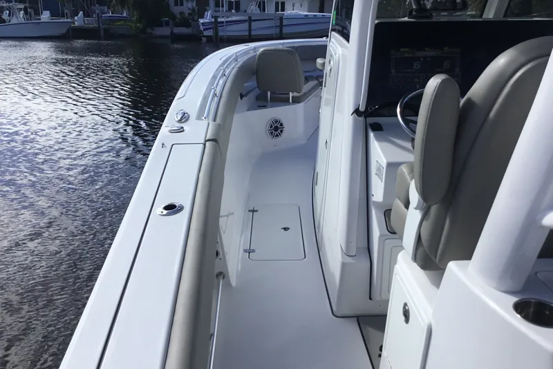 Slide: The Image of 2025 Sportsman Open 322 Center Console boat interior, featuring sleek design and modern amenities. - 33