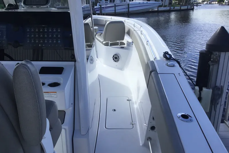Slide: The Image of 2025 Sportsman Open 322 Center Console boat interior, featuring sleek design and advanced controls. - 34