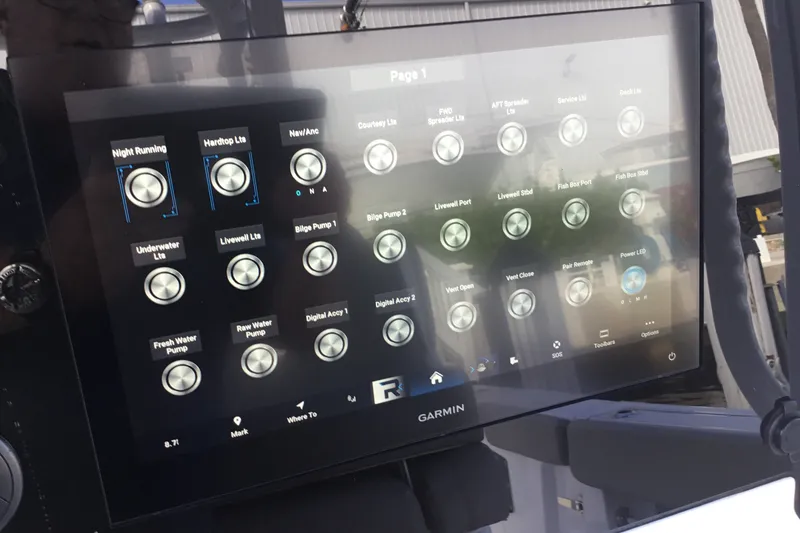 Slide: The Image of Touchscreen control panel on a 2025 Sportsman Open 322 Center Console boat. - 38