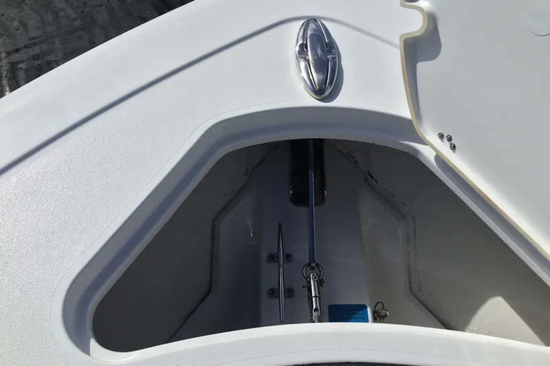 Slide: The Image of 2025 Sportsman Open 322 Center Console anchor locker, showcasing sleek design and functionality. - 18