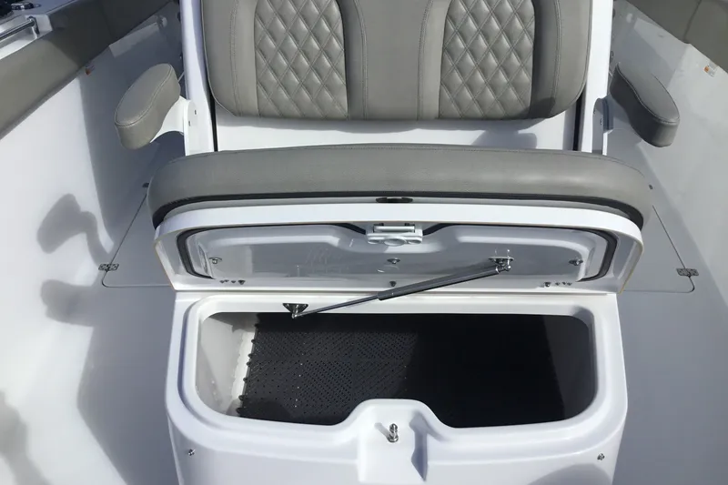 Slide: The Image of 2025 Sportsman Open 322 Center Console seat with open storage compartment. - 23