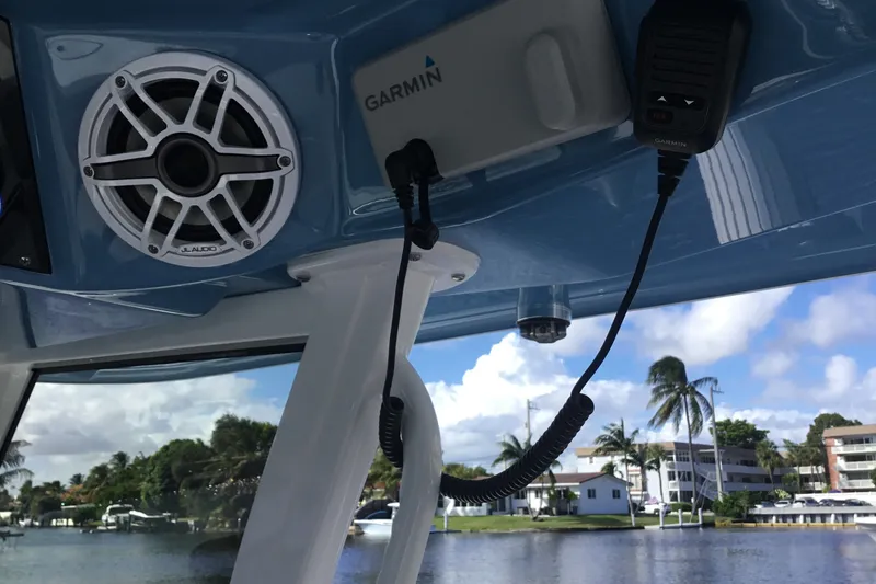 Slide: The Image of 2025 Sportsman Open 322 Center Console with Garmin electronics and JL Audio speaker system. - 43