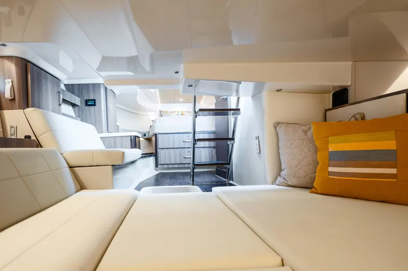 Slide: The Image of Luxurious interior of 2022 Regal 36 Grande Coupe yacht with modern furnishings. - 50