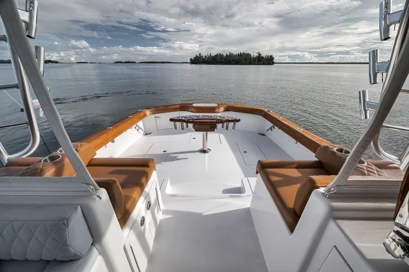 Slide: The Image of 2025 Release Boatworks 46 Express yacht with luxurious seating and ocean view. - 48