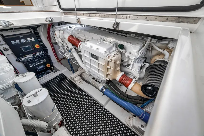 Slide: The Image of Engine room of 2025 Release Boatworks 46 Express, featuring MAN engines and advanced components. - 40